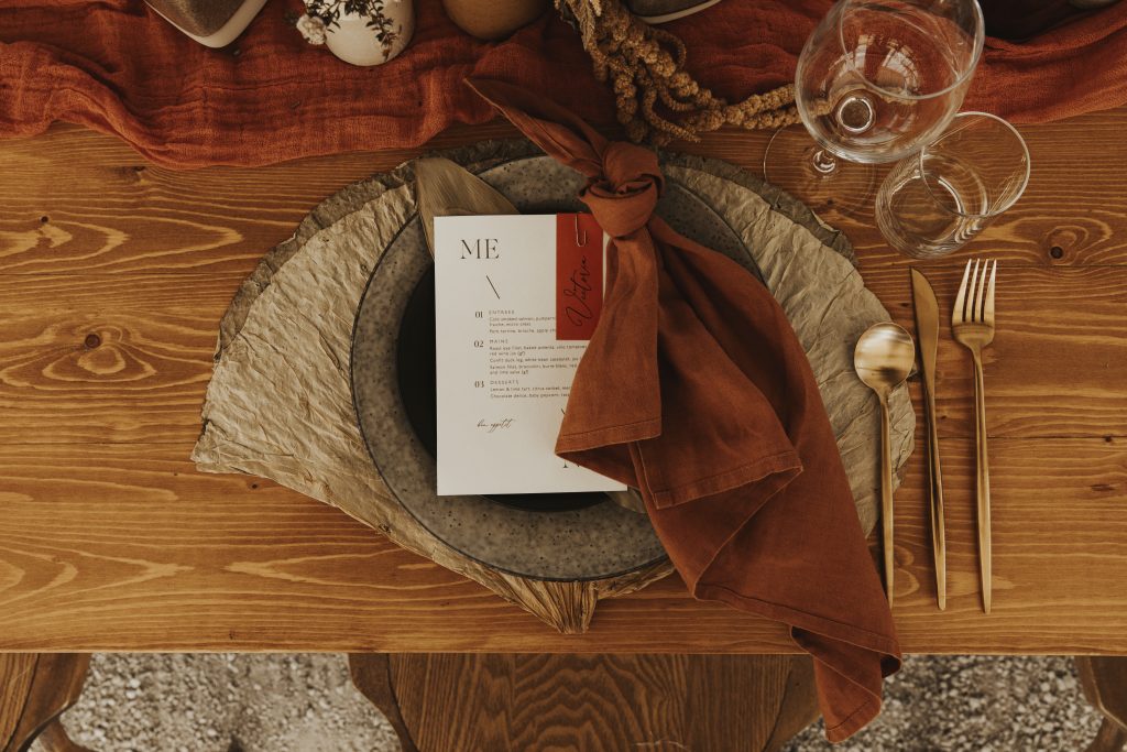 Aero Matte Gold Cutlery // Rust Napkins from The Pretty Prop Shop