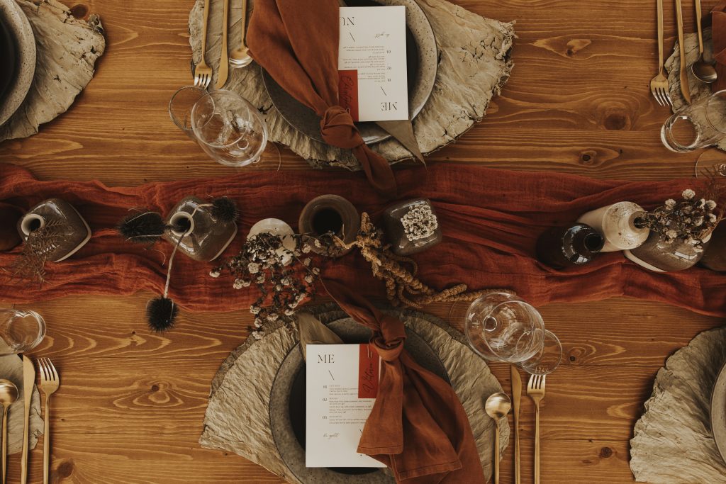 Aero Matte Gold Cutlery // Rust Napkins from The Pretty Prop Shop