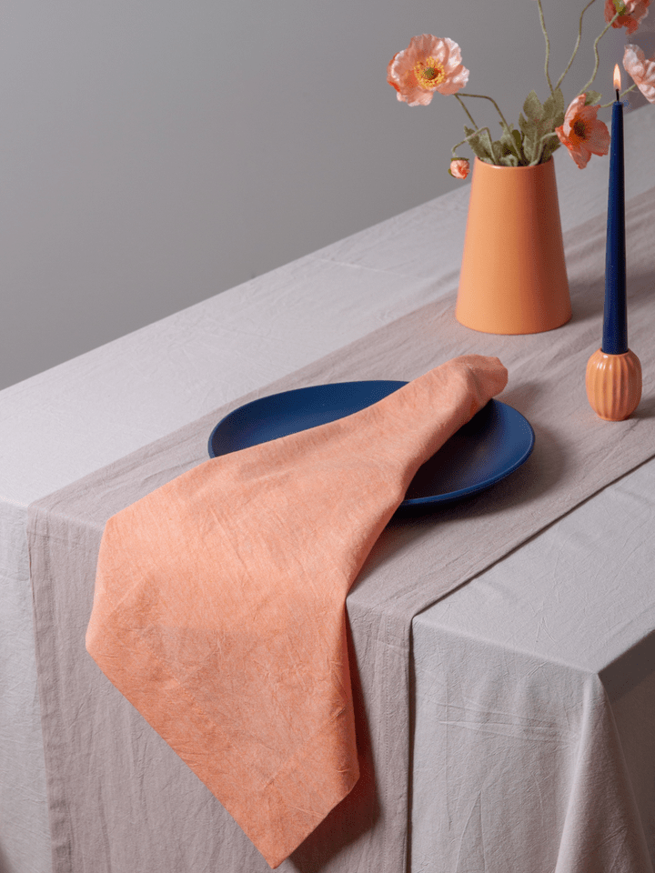papaya peach coloured napkin hire auckland nz